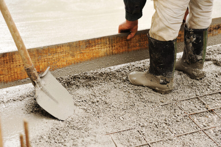 worker installing concrete